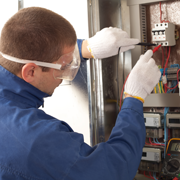 Electrician Checking Fuse Box